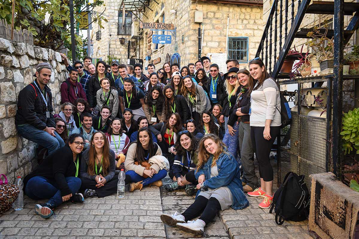 Alejandro with his Birthright Israel group in an alley in Tzfat.