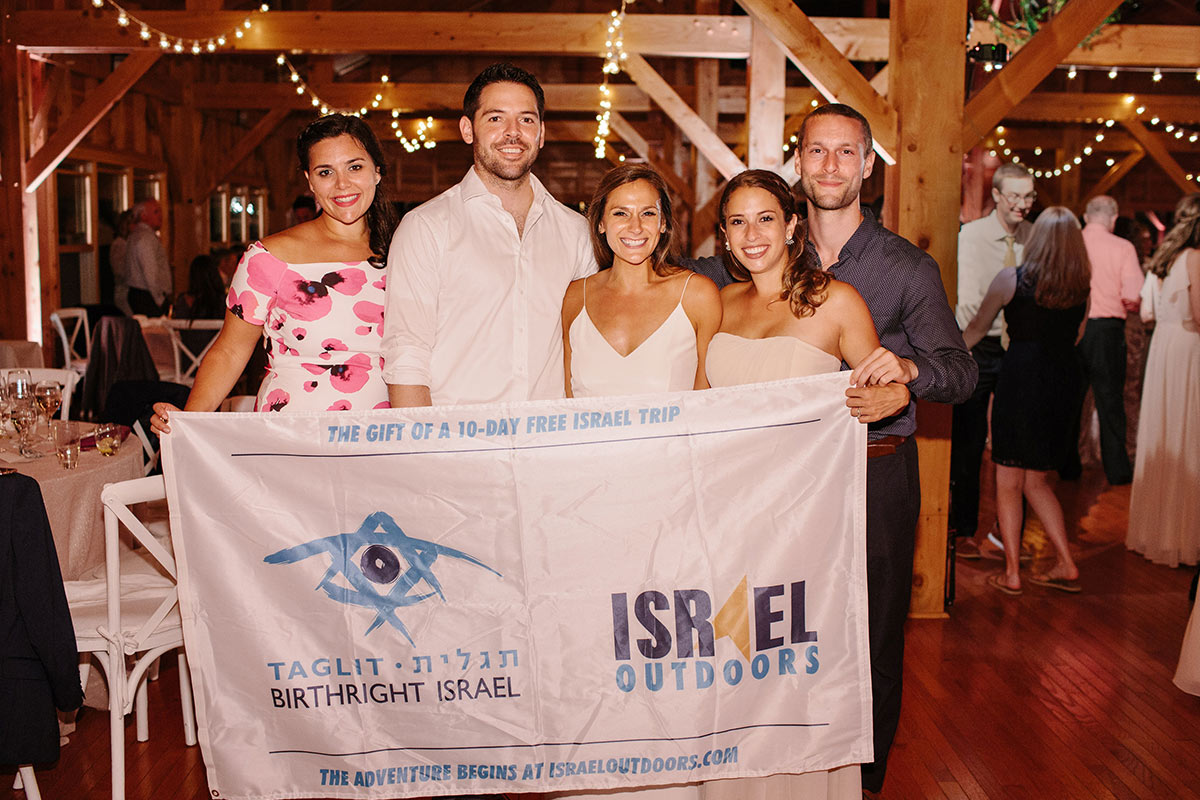 Carly and Alex met on Birthright Israel and are pictured here at their wedding.